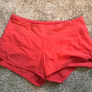 Red/orange lululemon shorts size 4